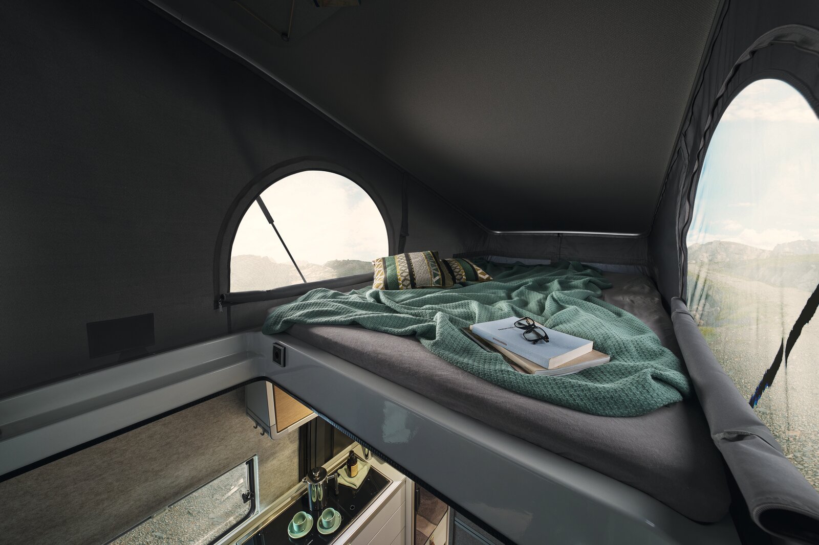 While falling asleep, you can admire the panorama through the windows in the side of the pop-top roof.